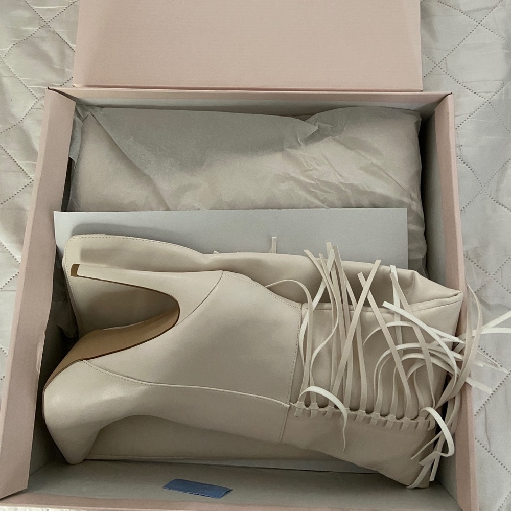 Fringe heeled boot